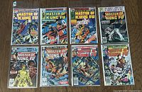 Eight Marvel Master of Kung Fu comic books arranged in two rows, each bagged and boarded.
