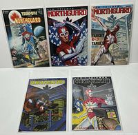 Front view of all five NorthGuard comics from New Triumph series, showing the covers and condition inside protective bags.