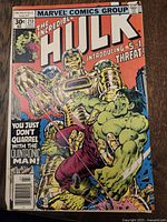 Front cover of The Incredible Hulk Comic Issue #213 showing Hulk grappling with the Quintronic Man. Priced at 30 cents, published by Marvel Comics Group in July 1977.