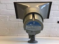 Front view showing the horn speaker and driver with University Sound label on rear driver housing.