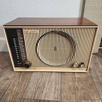 Front view of Zenith High Fidelity Radio H 845 showing tuning dial, speaker grill, and control knobs.