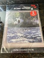 Front of sealed package showing branding, dimensions and contents