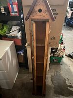 Cupboard open showing interior shelves