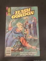 Front cover view of Flash Gordon comic, vibrant colors show main character and setting.