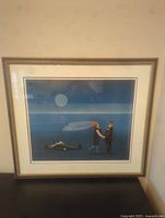 Framed lithograph artwork by Jan Balet against a beige wall showing entire frame and matting