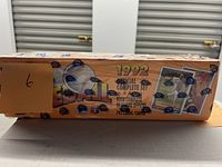 Side view of sealed box showing 1992 O-Pee-Chee baseball official complete set label and seal.