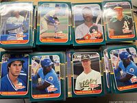 Stack of 1987 Donruss Rookies cards featuring Fred McGriff, Bill Long, James Steels, Terry Steinbach, Greg Maddux, Bo Jackson, and Mark McGwire among others.