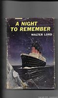 Front cover of 'A Night to Remember' showing an illustration of a large ocean liner ship at night with title and author name.