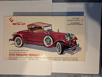 Top view of original box showing red 1930 Packard Roadster illustration and product details.
