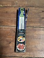 Photo of the vintage Taylor candy thermometer in its original box.