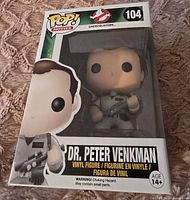 Front view of the Dr. Peter Venkman Funko Pop figure in its original box showing the figure and packaging details.