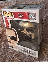 Front view of the WWE Diesel Funko Pop figure in original unopened box, displaying the figure and box condition.