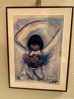 Front view of the framed DeGrazia Flower Boy print showing the image of the boy with flowers in a basket.