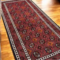 Full length view showing overall geometric pattern and border