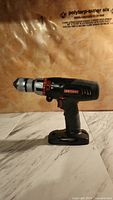 Front angled view of black Craftsman cordless drill body showing keyless chuck and ergonomic handle.