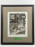Framed sepia etching showing full interior with cat lying on open book, grandfather clock, piano, and framed pictures.