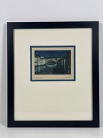 Front view of the framed etching showing overall condition and framing