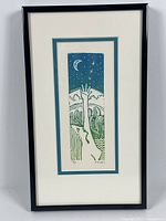 Framed woodcut print showing full artwork and frame.