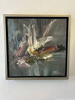 Front view of the abstract oil painting showing thick brush strokes and artist signature.