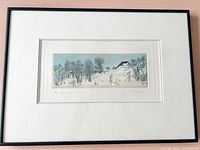 Close-up of the signature and numbering '65/200' along with the handwritten artwork title by the artist below the etching.