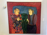 Full front view of painting showing three figures, red spotted border and wooden frame