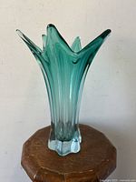 Frontal photo of aqua turquoise Murano art glass vase for size and shape reference.