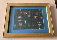 Frontal view of framed Paul Klee print 'Magic Fish' showing the full artwork and frame covering.