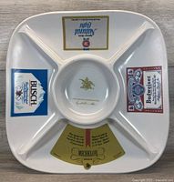Top-down photo of a square white ceramic chip tray divided into five compartments displaying four Anheuser Busch beer brand logos and central 1978 Sales Convention text/logo.