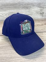 Front view of navy blue baseball cap with 1999 All Star Game embroidered patch on front.