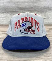 Front view of the gray and navy fitted hat with embroidered Patriots name and logo on the front panel.