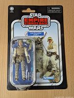 Front view of unopened Luke Skywalker (Hoth) Star Wars action figure in original packaging with Empire Strikes Back branding and Kenner logo.