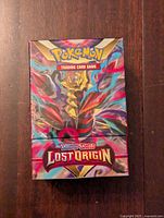 Front view of the deck box showing Giratina artwork and 'Sword & Shield Lost Origin' branding