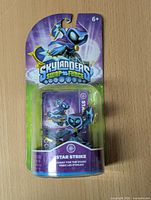 Front view of unopened Skylanders Swap Force Star Strike figure in original packaging showing character and branding.
