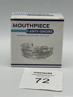 Photo of the front of the box showing product name, image of the mouthpiece and key features.