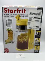 Front view of original box showing the Starfrit brand electric iced tea and iced coffee maker with 2.5L capacity glass pitcher and product image.