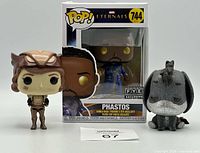 Front view of all three Funko Pop! figures showing Marvel Eternals Phastos boxed, fantasy character, and glitter Eeyore