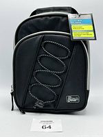 Front view of black Tech Gear insulated lunch bag showing zippered compartments, front bungee detail, and attached tag.