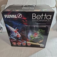 Box of Fluval Betta Premium Aquarium Kit showing branding and product image.