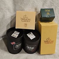 Several Harmony Kingdom figure boxes with branding Lord Byron's Harmony Garden and Harmony Kingdom