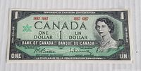 Front side of 1967 Canadian Centennial One Dollar bill featuring Queen Elizabeth II and bilingual text.