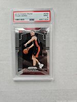 Front of the graded Tyler Herro 2019 Panini Prizm rookie card showing player image and PSA Mint 9 grade.