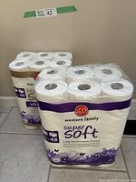 Two shrink-wrapped packages of Western Family Super Soft 2-ply toilet paper, each containing 24 rolls, totaling 48 rolls.