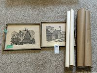 Lot overview showing two framed etchings and three rolled prints