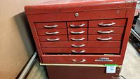Red Dayton multi-drawer tool chest front view showing multiple drawers and chrome handles.