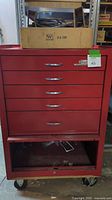 Red Dayton work cabinet, six drawers, on casters, no key visible