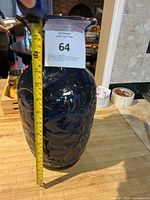 Cobalt blue vase shown standing next to measuring tape indicating height ~15 inches.