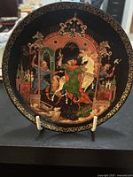 Front view of The Firebird collection plate number 5 with detailed colorful artwork of Golden Bridle and gold border.