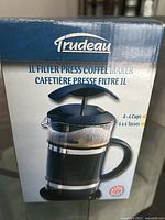 Box of Trudeau 1L filter press coffee maker showing front label and capacity details (4-6 cups).
