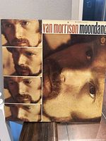 Front cover of Van Morrison Moondance vinyl album featuring close-up face image.