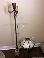 Floor lamp and table lamp shown together for size and style comparison.